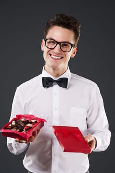 Man giving a chocolate praline box