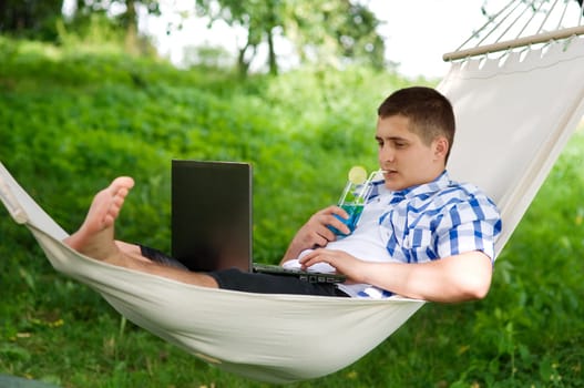 Man relaxing in a hammock