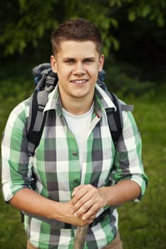 Man walking through forest