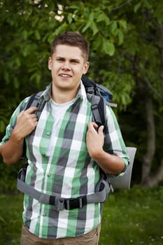 Man walking through forest