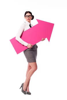 Gorgeous businesswoman holding pink arrow sign