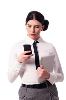 Busy woman with a phone and digital tablet
