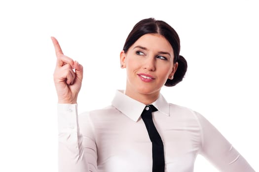 Businesswoman pointing to copy space