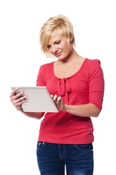 Focused woman using digital tablet