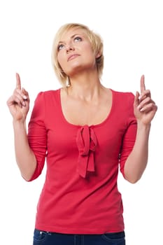 Young woman showing something above her head
