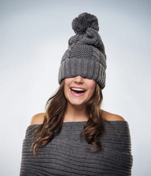 Young woman have fun with wool clothes