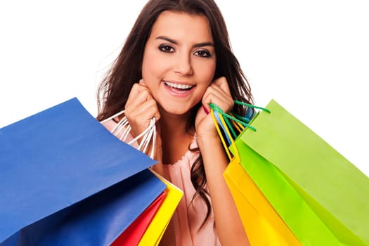 Happy woman with full of shopping bags