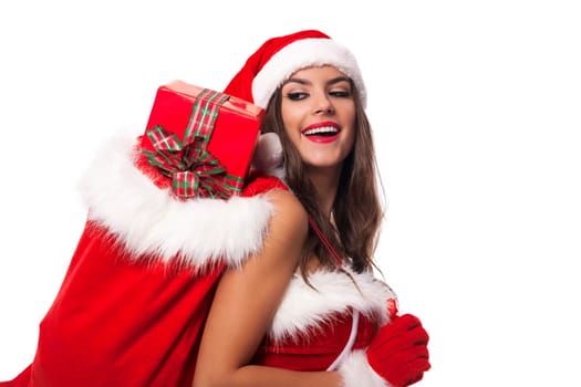 Happy woman with sack of santa claus