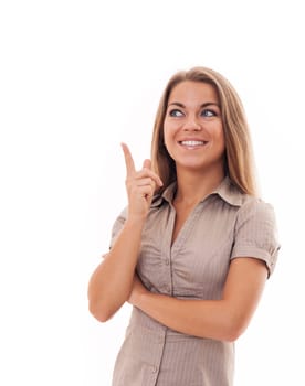 Attractive woman pointing at copyspace