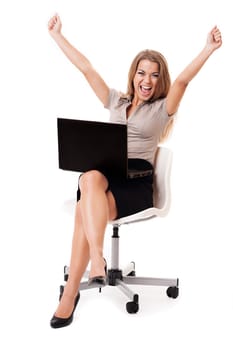 Successful businesswoman with laptop on knees