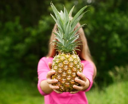 Pineapple in hands
