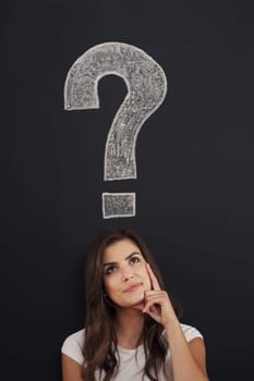 Big question mark on blackboard