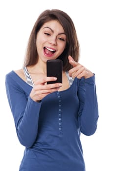 Excitement woman with mobile phone pointing at camera
