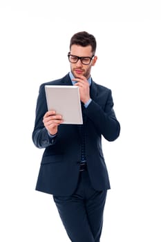 Focused man working with a digital tablet