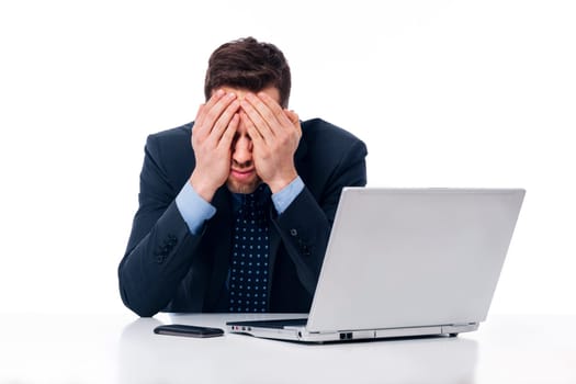 Tired businessman at work