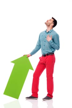 Happy man with green arrow looking up