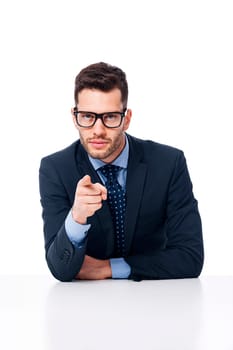 Handsome businessman showing on the camera