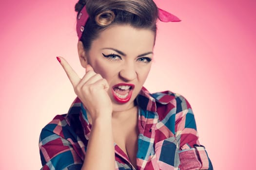 Angry sexy retro woman shaking her finger