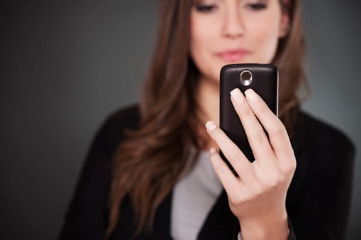 Young businesswoman using smart phone