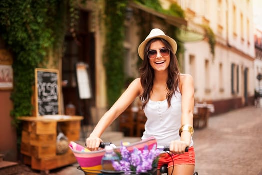 Beautiful woman riding on bike