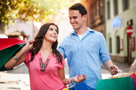 Young couple enjoying shopping together
