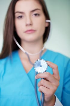 Doctor holding stethoscope