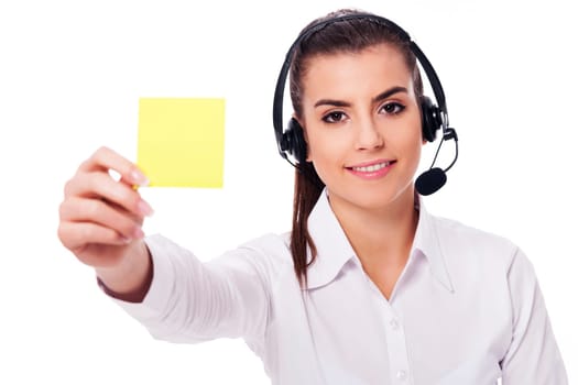 Female operator holding yellow note