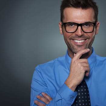Handsome smug look man looking at camera