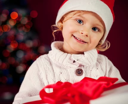 Little girl with christmas present