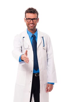 Smiling doctor offering handshake