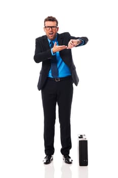 Angry businessman waiting for late business partner