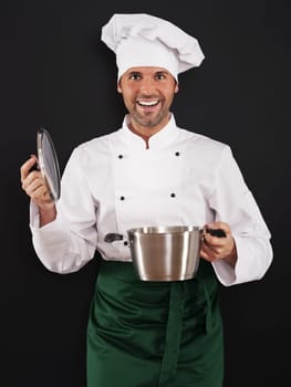 Chef cooking with pot