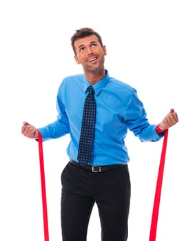Business man trying free themselves from clutches of corporate