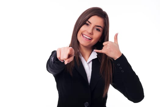 Cheerful woman gesturing "call me"""
