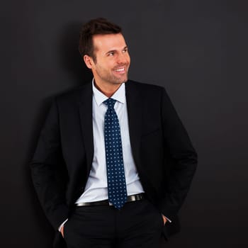 Portrait of handsome and smiling businessman