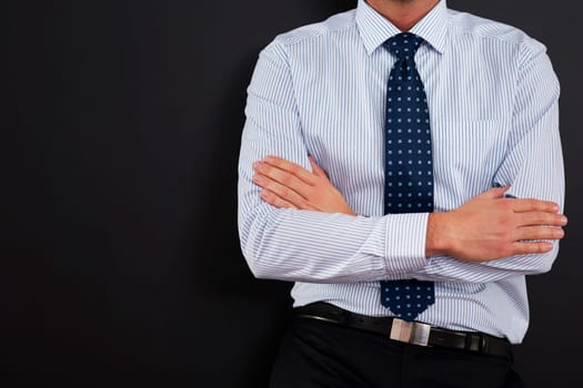 Close up of businessman with arms crossed
