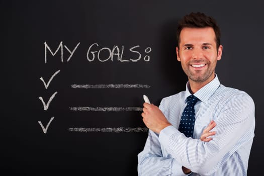 Businessman is ready to writing his goals