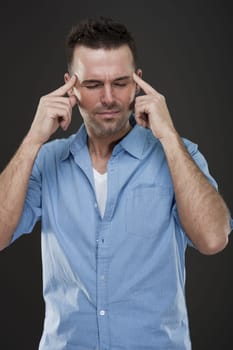 Handsome man with headache