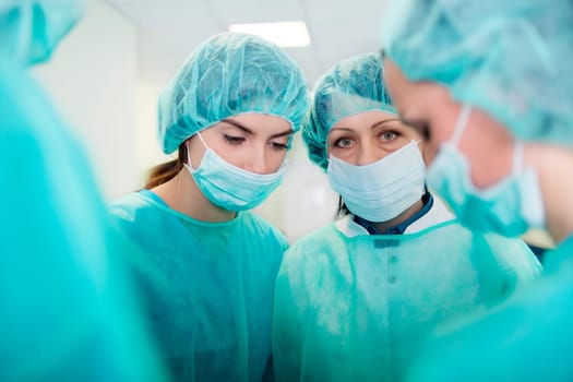Doctors preparing for surgery