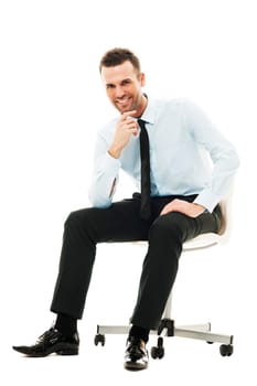 Successful businessman sitting on chair