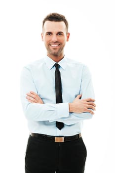Portrait of smiling businessman with arms crossed