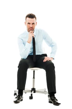 Pensive businessman sitting on chair