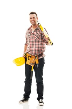 Smiling construction worker with work tool