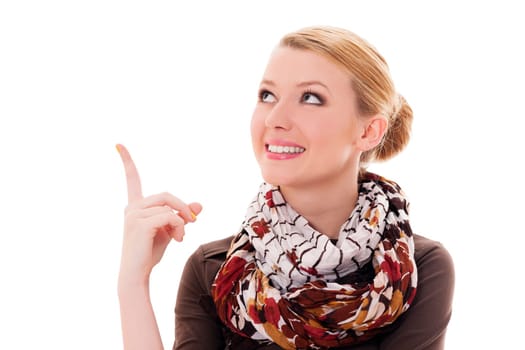 Young blonde woman pointing up