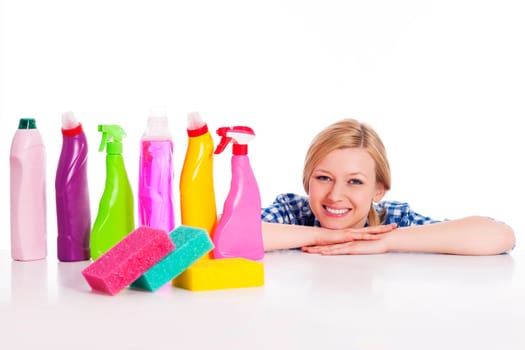 Perfect housewife with the cleaning equipment