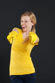 Female cleaner pointing fingers on you