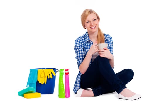 Young woman relaxing after cleaning