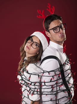 Nerd couple have problems with christmas decoration