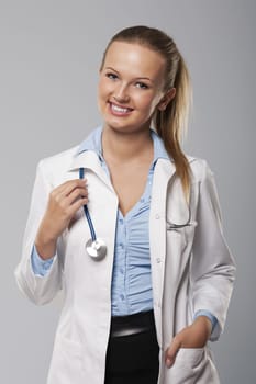 Happy and beautiful female doctor