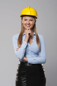 Portrait of beautiful and smiling architect woman
